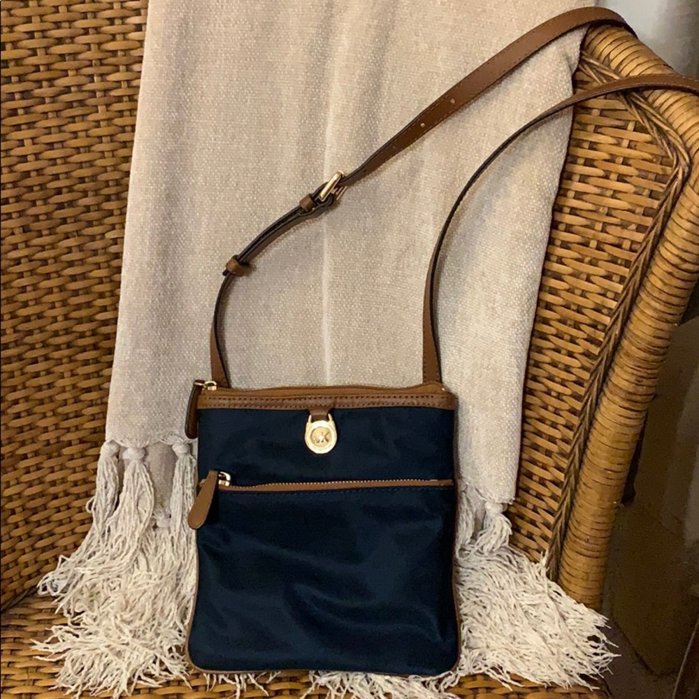 Micheal Kors navy crossbody purse.